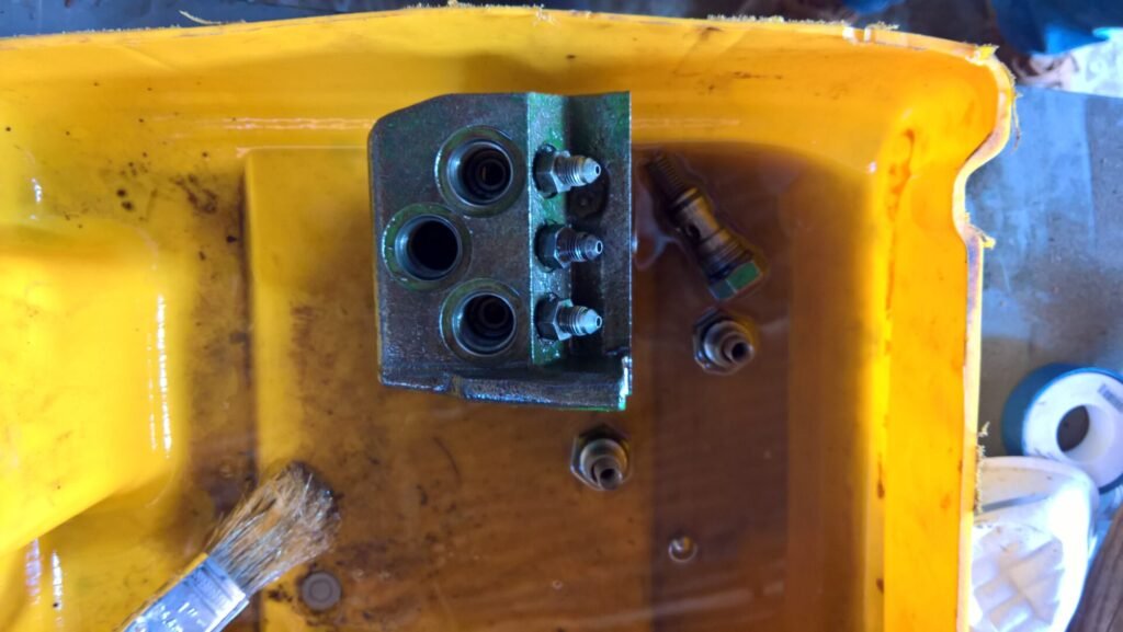 John Deere 3020 brakes valve overhauling